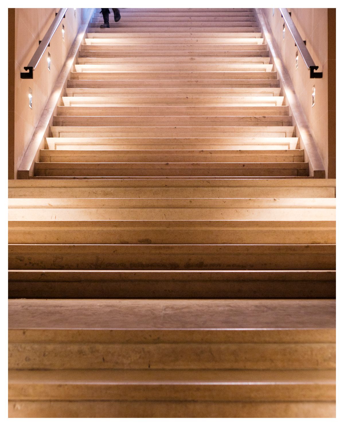 Shot inside the Louvre. One of the majectic stairs on our way to the Mona Lisa.