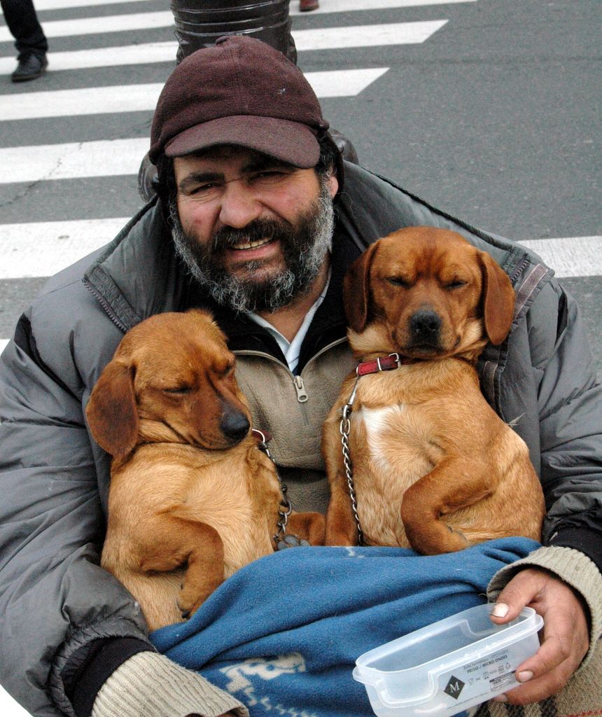 Beggar outside Notre Dame in Paris, making a very lucrative business for himself it has to be said.