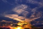 The swirl of cloud at dusk.