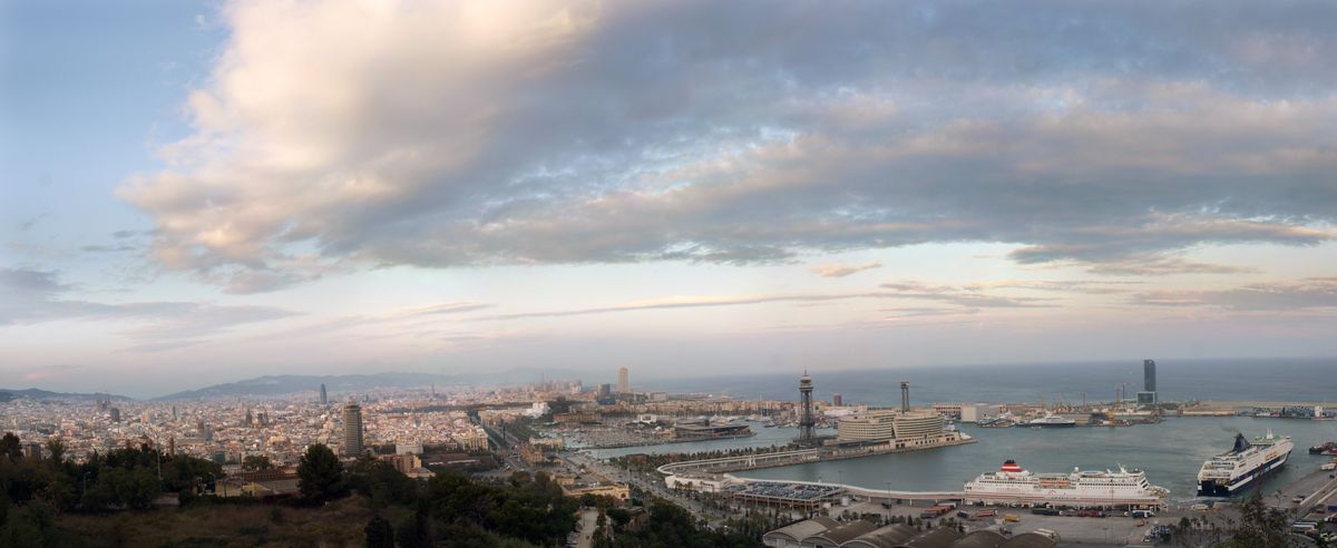 Angel Guerrero View of Barcelona harbour from the hill of Montjuic near the sun set.